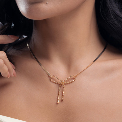 Carmen Pepper Bow Necklace